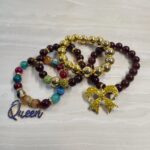 Gold and Maroon Queen and Bow Bracelet Set